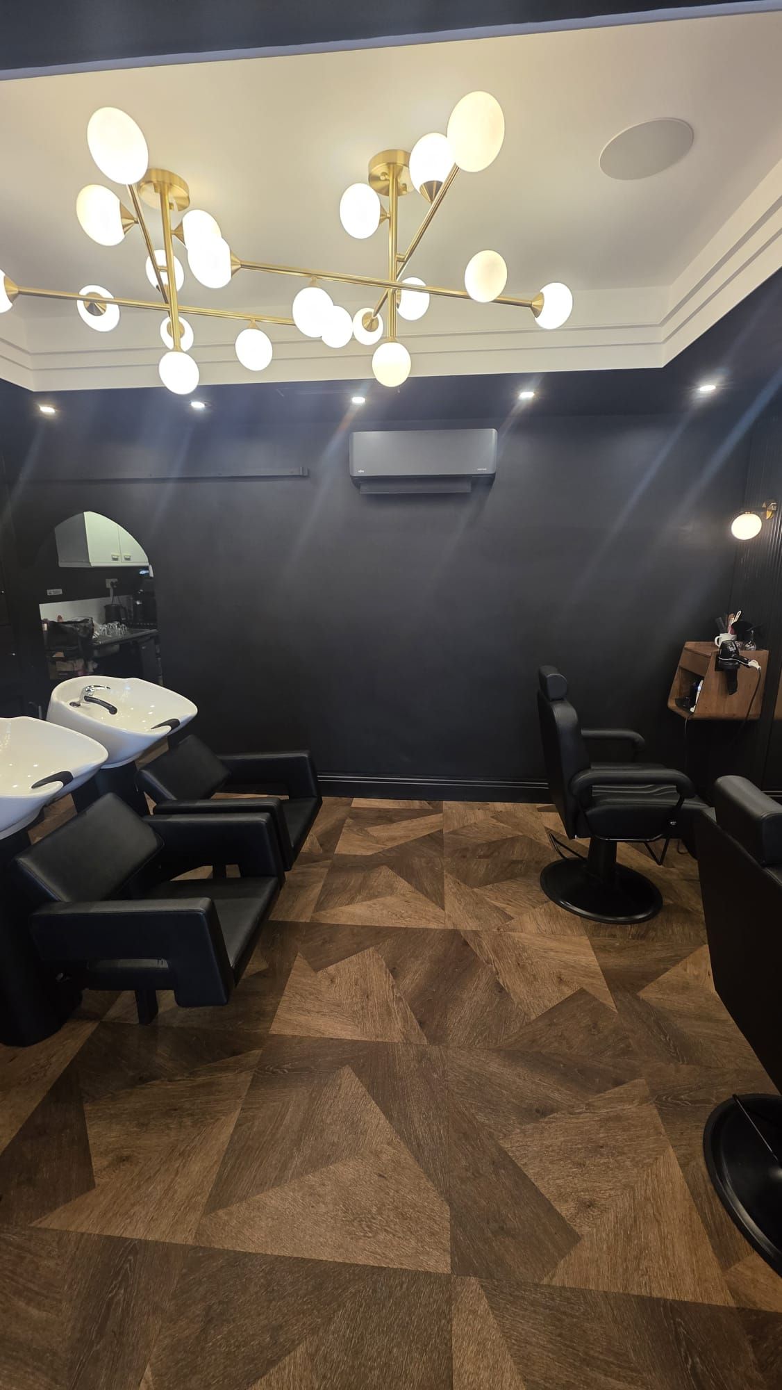 Salon feature wall before wallpapering